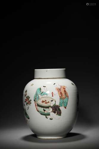 A QING KANGXI PERIOD RED GLAZED FIGURAL VASE