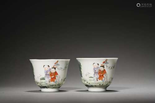 A PAIR OF QING FIGURAL CUPS