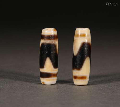 Pair of Tiger Tooth Dzi Beads Before Ming Dynasty