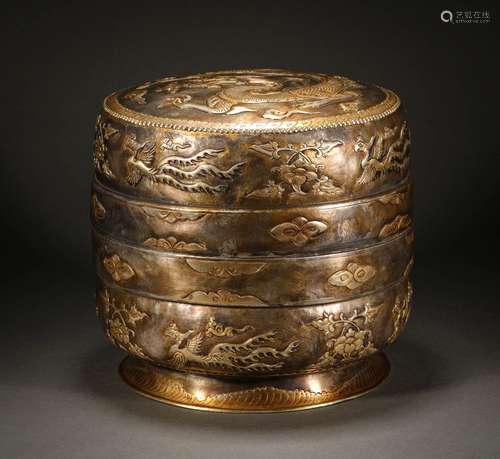 A gilt box with dragon and phoenix presenting auspicious cov...