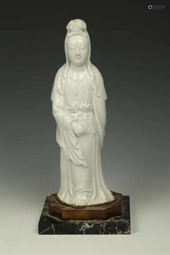 A 20th century Dehua white-glazed standing Guanyin