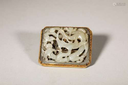 A gold plated jade buckle