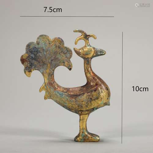 An ancient gilded golden phoenix bird