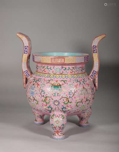 A Qing Dynasty pastel colored Eight Treasure Stove with tang...