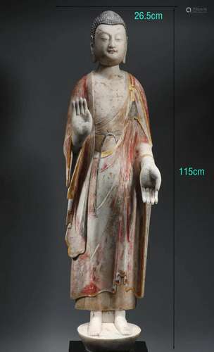 Ancient painted white stone Buddha statues