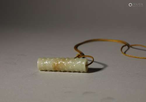 An ancient jade tube