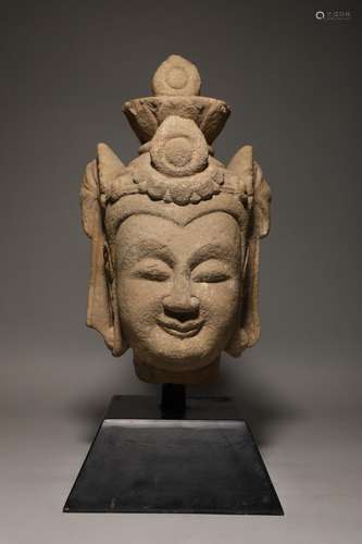 A red sandstone Buddha head before the Ming Dynasty