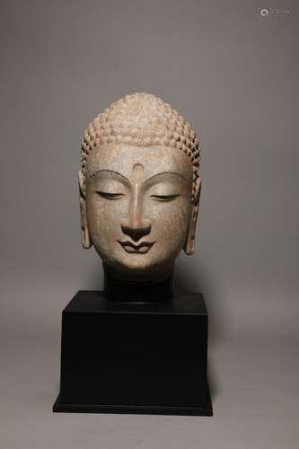 A blue stone Buddha head before the Ming Dynasty