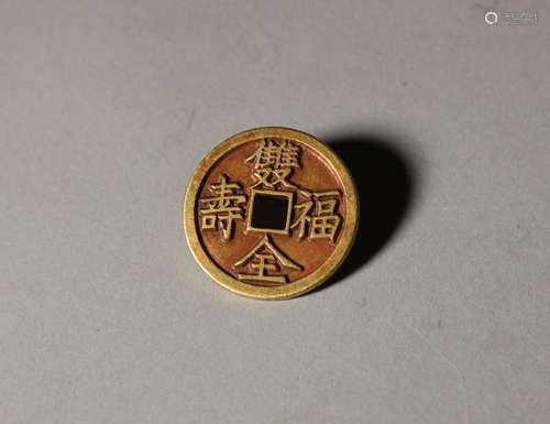 A Qing Dynasty gold coin with both blessing and longevity