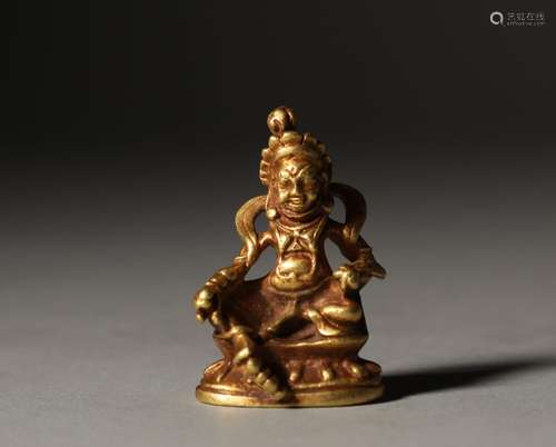 An old pure gold Buddha statue