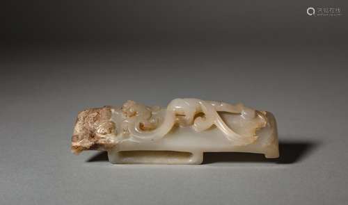 An ancient jade dragon with a hook