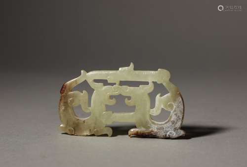 An ancient Ming Dynasty carved jade pendant