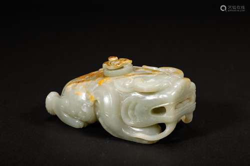 A Ming Dynasty jade carving auspicious beast