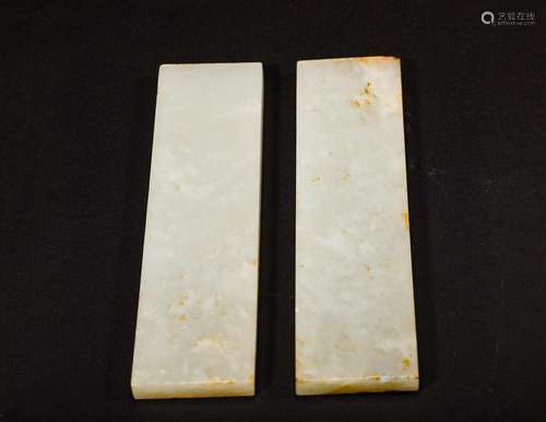 A pair of inscribed jade paper weights,Qing Dynasty