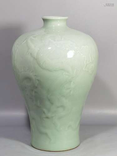 Pink celadon glaze carved seawater dragon pattern plum vase