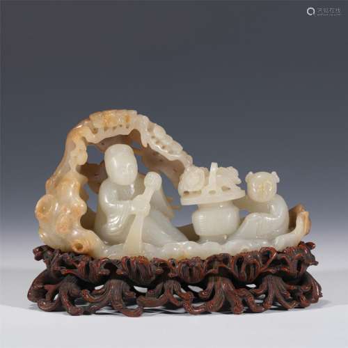 A JADE CARVED FIGURE ON BOAT