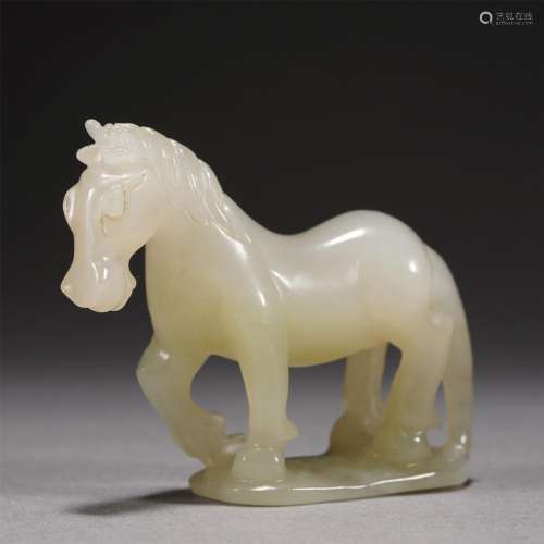 A CARVED JADE HORSE