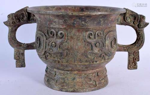 A CHINESE TWIN HANDLED ARCHAIC BRONZE CENSER 20th Century. 3...