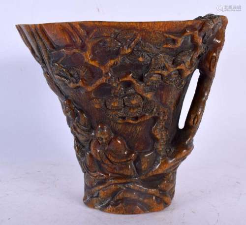 A CHINESE CARVED BUFFALO HORN LIBATION CUP 20TH Century. 809...