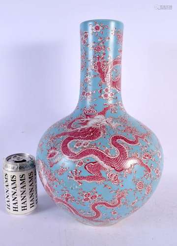 A CHINESE BLUE GROUND PORCELAIN DRAGON VASE 20th Century. 38...