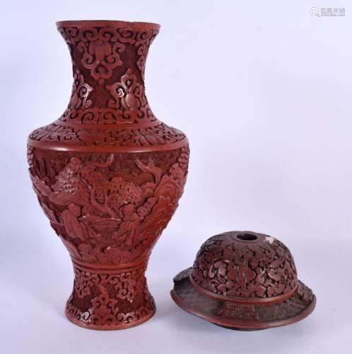 A 19TH CENTURY CHINESE CARVED CINNABAR LACQUER BALUSTER VASE...