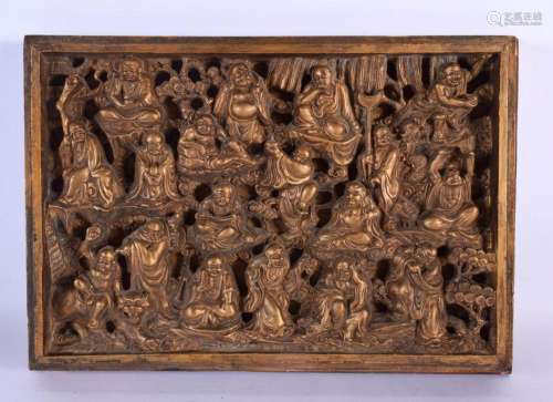 A 19TH CENTURY CHINESE CARVED GILTWOOD EIGHTEEN LUOHAN PANEL...