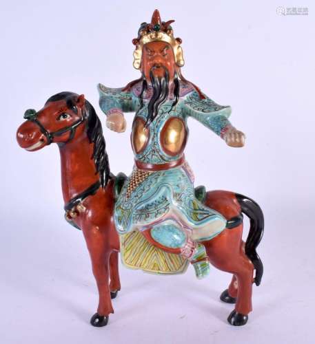 AN EARLY 20TH CENTURY CHINESE PORCELAIN FIGURE OF A MALE mod...
