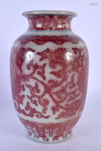 A CHINESE IRON RED PORCELAIN VASE 20th Century, painted with...