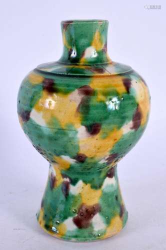 A CHINESE QING DYNASTY SPINACH AND EGG GLAZED PORCELAIN VASE...