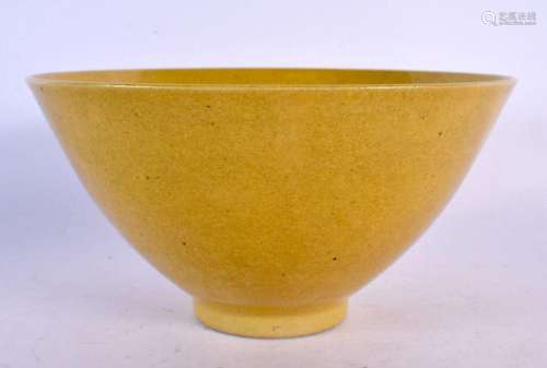 A 17TH/18TH CENTURY CHINESE IMPERIAL YELLOW GLAZED CONICAL B...