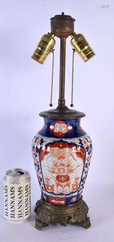 A 19TH CENTURY JAPANESE MEIJI PERIOD IMARI RIBBED LAMP paint...