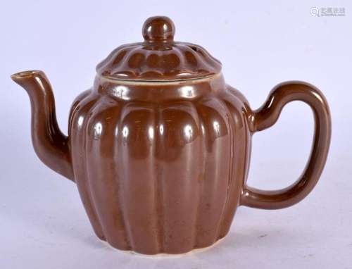 AN 18TH CENTURY CHINESE CAFE AU LAIT RIBBED TEAPOT AND COVER...