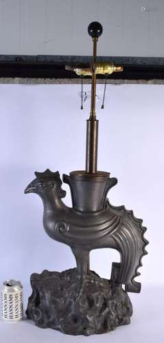 A RARE CHINESE DYNASTY PEWTER PHOENIX BIRD LAMP upon a natur...