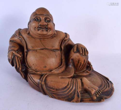 A 19TH CENTURY CHINESE CARVED HARDWOOD FIGURE OF A BUDDHA Qi...