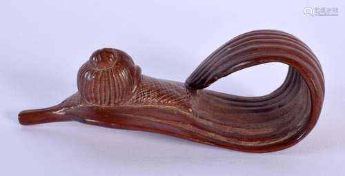 A JAPANESE CARVED WOOD SNAIL AND LEAF NETSUKE. 11.5 cm x 4.2...