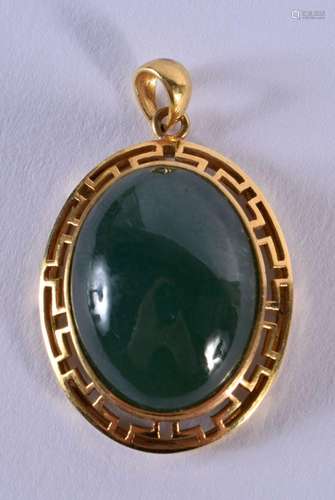 A CHINESE REPUBLICAN PERIOD 18CT GOLD AND JADE PENDANT. 7.9 ...