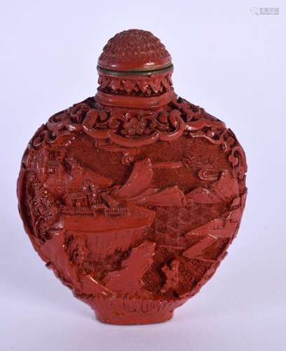 A CHINESE CARVED CINNABAR LACQUER SNUFF BOTTLE AND STOPPER 2...