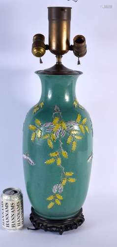 A LARGE 19TH CENTURY CHINESE GREEN GLAZED PORCELAIN LAMP ove...