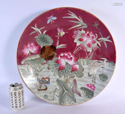 A LARGE CHINESE REPUBLICAN PERIOD RUBY GROUND DISH painted w...