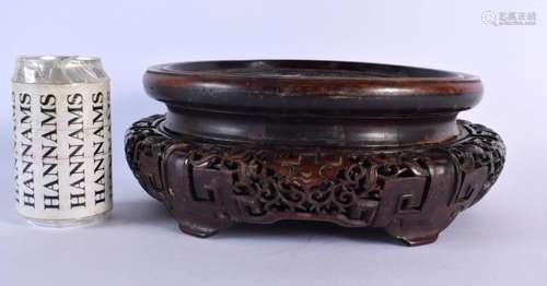 A LARGE 19TH CENTURY CHINESE CARVED HARDWOOD DISPLAY STAND Q...