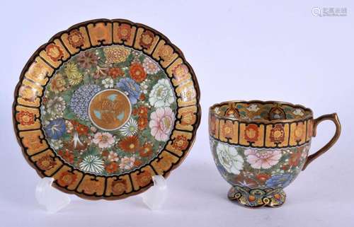 A LATE 19TH CENTURY JAPANESE KUTANI PORCELAIN CUP AND SAUCER...