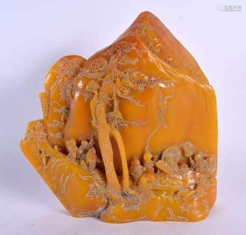 A LARGE CHINESE CARVED ORANGE SOAPSTONE TYPE MOUNTAIN GROUP ...