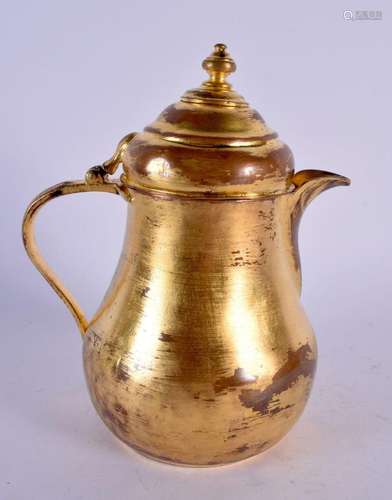 AN UNUSUAL TURKISH OTTOMAN BRONZE TOMBAK JUG. 18 cm x 12 cm.