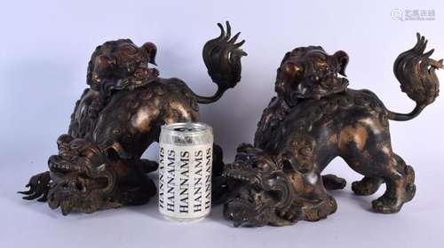 A PAIR OF CHINESE BRONZE BUDDHISTIC LIONS AND COVERS 20th Ce...