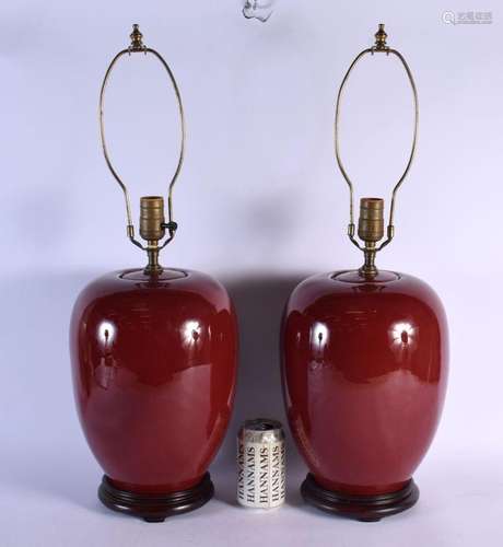 A PAIR OF CHINESE SANG DU BOEUF GINGER JAR AND COVER LAMPS. ...