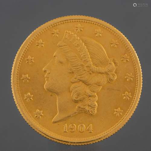 Monedas
Pièce de vingt dollars américains en or jaune.