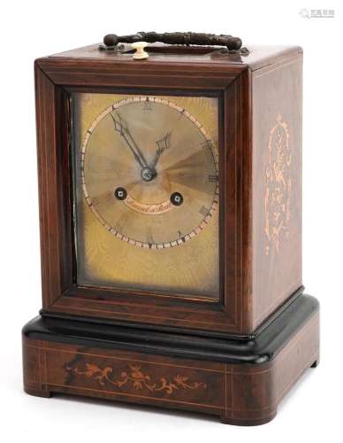 French inlaid rosewood travel clock striking on a bell with ...