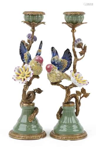 Pair of antique style porcelain and bronze candlesticks in t...