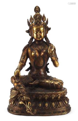 Large Chino Tibetan gilt bronze and jewelled figure of seate...