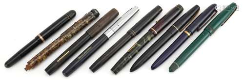 Nine vintage fountain pens, some with gold nibs, including P...